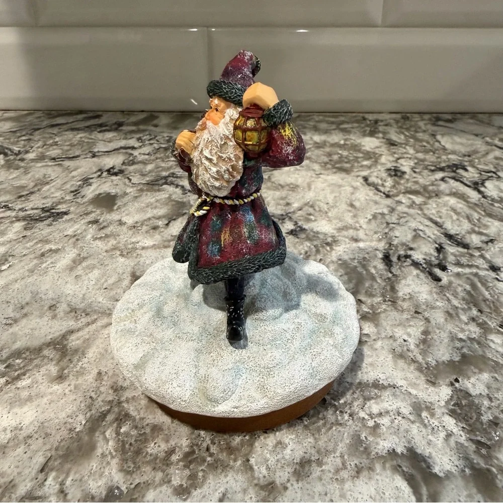Lang Candle Topper Santa’s Coat of Colors Holiday Christmas‎